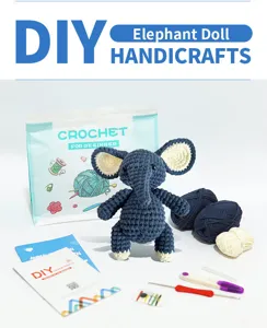 Detail view of the DIY crochet elephant doll kit, featuring soft blue yarn and crafting tools.