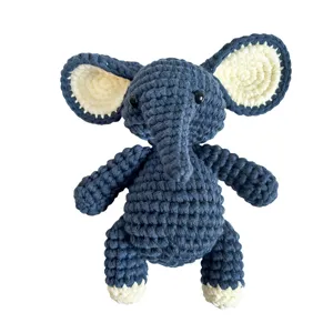 Handcrafted blue crochet elephant plush toy, cute DIY stuffed animal doll for home decor.