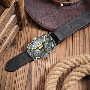 Men's vintage western cowboy embossed leather belt with alloy bull head buckle detail view.