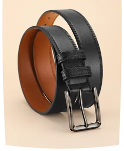 Detailed view of black leather belt with brown lining and metal pin buckle for men casual wear.