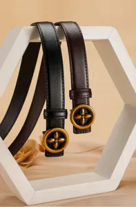 Women genuine leather belt detail shot, vintage metal flower buckle, premium versatile style.