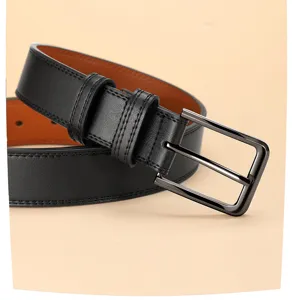 Close-up of men's genuine leather belt with dark metal pin buckle and dual loops for style.