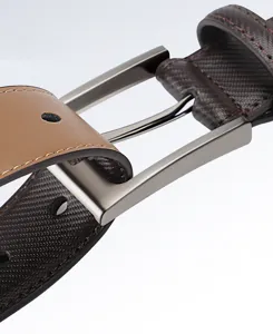 Detail shot of a men's genuine leather belt with a sleek metal pin buckle and dual-color strap.