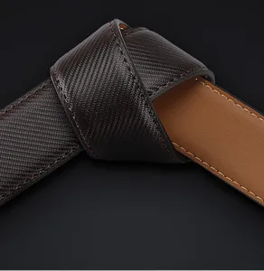 Men's genuine leather belt detail shot, premium textured surface with contrast lining design.