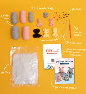 Detailed flat lay of crochet kit components including colorful yarns, hook, stuffing and pattern.