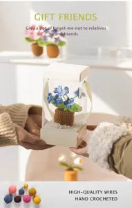 Handmade crochet forget-me-not flower potted plant detail view, perfect gift choice for friends.