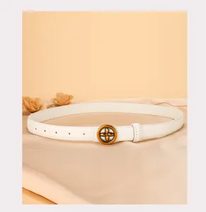 Detailed view of stylish white leather belt for women, elegant metal buckle detail.