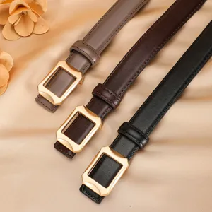 Women genuine leather slim belt with metal rectangular buckle, stylish accessory for jeans.
