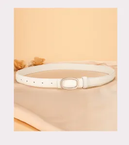 Women's genuine leather thin belt with elegant oval buckle, ideal for jeans and dresses.