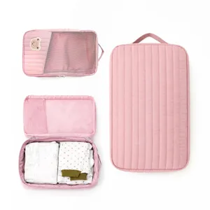 Pink quilted travel packing cubes set with cute bear patch, large mesh storage bags for clothes.