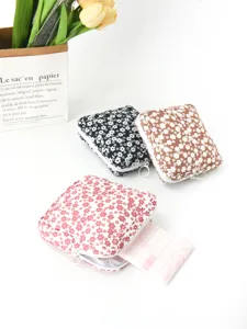 Pochette de rangement pour serviettes hygiéniques à fleurs, trousse zippée portable.