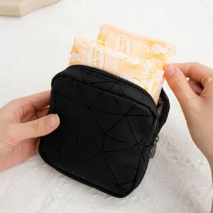 Draagbare PU-leder verband opbergtas, veelzijdige cosmetische en menstruatietas voor vrouwen.