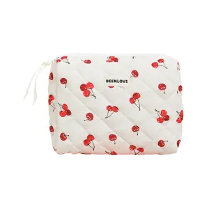 White quilted cosmetic bag with cute red cherry pattern and large capacity makeup storage pouch.