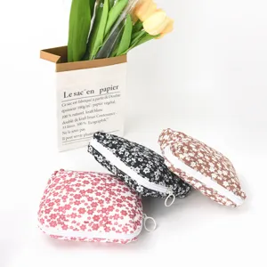 Sac de rangement hygiénique floral portable et jolie pochette de menstruation mignonne.