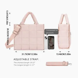 Detailed view of the pink quilted tote bag displaying size measurements and adjustable strap.