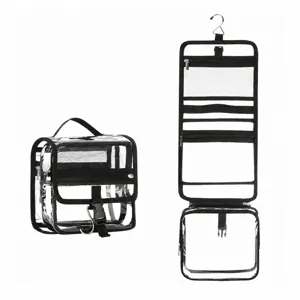Clear PVC hanging toiletry bag with large capacity, multi-layer travel cosmetic storage bag.