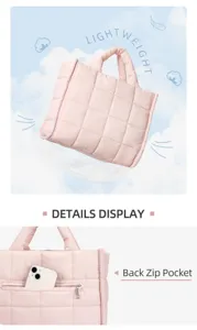 Pink quilted tote bag detail view showing soft puffer shoulder design and back zip pocket.