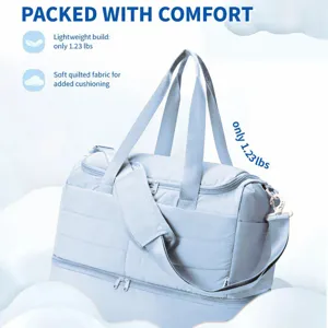 Quilted travel duffel bag detail showcasing lightweight build, soft fabric, and spacious interior.