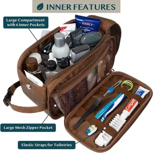 Gran neceser de viaje para hombre con múltiples compartimentos y bolsillos de malla.