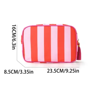 Striped cosmetic bag with tassel waterproof travel toiletry storage organizer pouch for women.