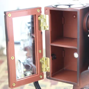 Retro vintage projector music box with double storage compartments and brown finish.