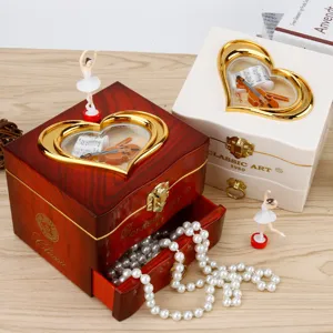 Heart shaped wooden music box with ballerina dancing figurine and drawer for jewelry storage gifts