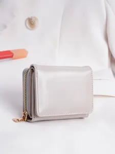 Women's stylish trifold leather wallet with zipper coin pocket, compact card holder.