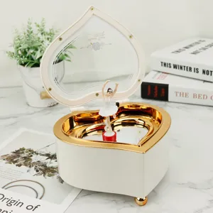 Heart-shaped music box with dancing ballerina figurine, wind up musical gift box.