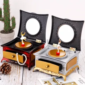 Vintage ballet music box with jewelry storage drawer, elegant retro design gift for girls.