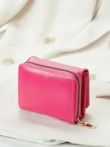 Pink trifold women wallet detail shot, compact zipper coin pouch and card holder for daily use.