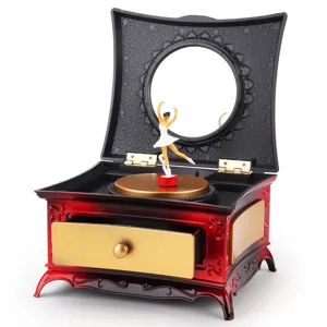 Vintage ballerina music box with jewelry storage, rotating dancer, mirror, and drawer gift.