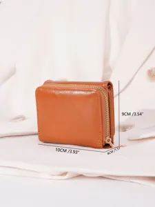 Stylish brown trifold women wallet with zipper coin pocket, compact leather purse for cards and cash.
