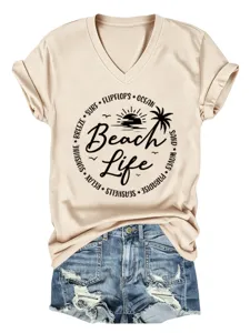 Casual women's V-neck short sleeve t-shirt with beach life print paired with denim shorts.