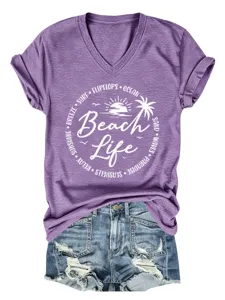 Detailed view of casual purple V-neck short sleeve t-shirt paired with denim shorts.