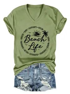 Green V-neck short sleeve t-shirt with beach life graphic and denim shorts detail.