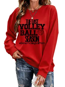 Nahaufnahme des roten Sport-Sweatshirts mit Volleyball-Themenprint und gerippten Details.