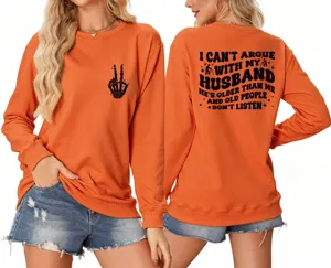 Orange long sleeve crewneck sweatshirt featuring funny back text and skeleton hand graphic.