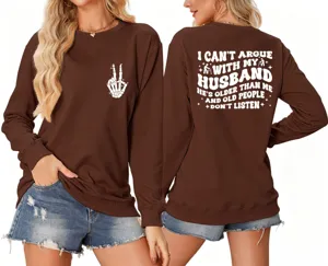 Detail view of brown long sleeve sweatshirt featuring funny back quote print and front skeleton hand.