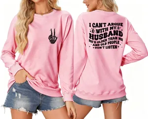 Women's pink graphic crewneck sweatshirt with funny slogan print and casual long sleeves.
