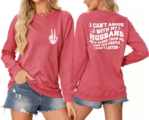Detailed view of women's long sleeve crewneck sweatshirt featuring funny back print and graphic.