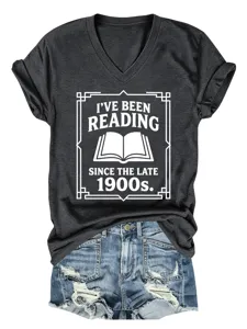 Detailed view of dark gray V-shirt featuring vintage reading graphic and soft cotton fabric.