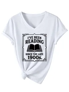 Close-up detail of the vintage reading quote print and knot hem on the white tee.