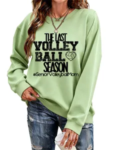 Lässiger salbeigrüner Damen Pullover mit Volleyball Motiv und klassischem Rundhalsausschnitt.