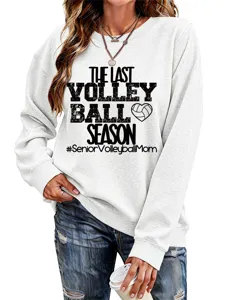 Nahaufnahme des detaillierten Volleyball Motivs auf dem weissen Freizeit Pullover.