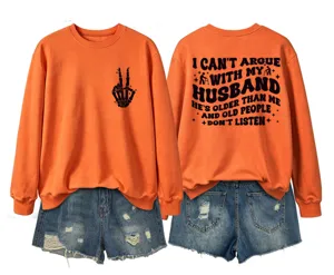 Detailed view of the orange long-sleeve graphic sweatshirt showcasing back quote design.