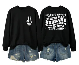 Detailed view of the casual black sweatshirt featuring humorous back text and skeleton hand print.