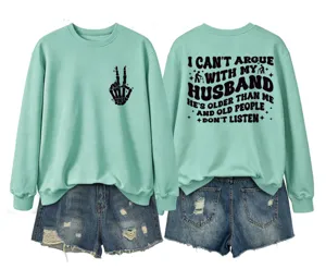 Detailed front and back view of mint green sweatshirt with funny text and skeleton hand.