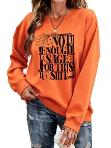 Women casual long sleeve orange sweatshirt with fun letter print graphic pullover top.