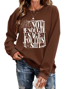 Brown long sleeve sweatshirt detail, comfortable casual pullover with graphic print for women.