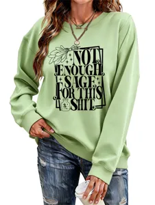 Casual long sleeve crewneck sweatshirt for women featuring a graphic print and comfortable fit.